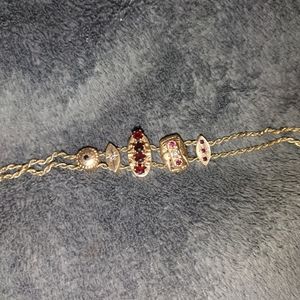14K double Rope slide bracelet with 5 14k and Ruby slides